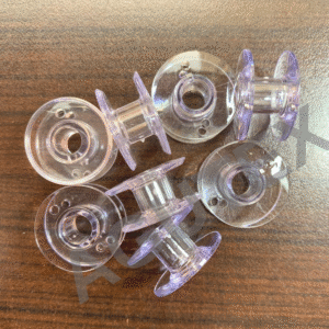 Carrete plastico para maquina coser domestica bordadora Brother de 11,5mm